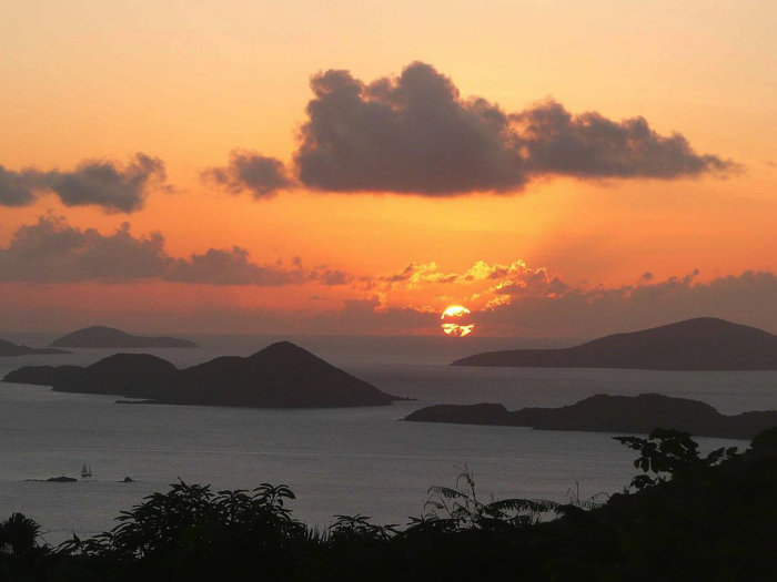 Sunset at the Summer Solstice behind Thatch Cay and Great Hans Lollik